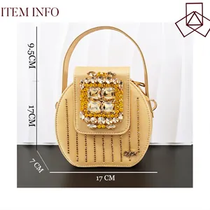 Elegante goldene runde Abendtasche mit Kristallverschluss und Maßen 17x17x7 cm