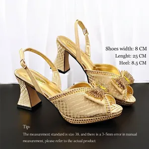 Gold snakeskin chunky heel sandals with bow detail and size parameters
