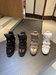 Row of women's hidden wedge high-top sneakers in four colors with velcro straps