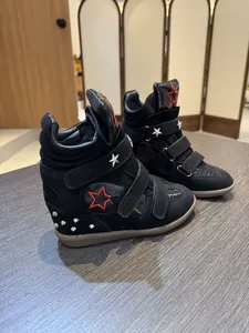 Stylish black high-top wedge sneakers for women with red star and silver stud details