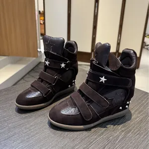Womens dark brown high-top wedge sneakers with Velcro straps and silver star studs
