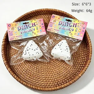 Realistic onigiri rice ball squishy toy in packaging with 64g weight and 6x6x3cm size