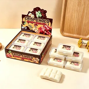 Witte chocoladereep squishy speelgoed in transparante opbergdoos.