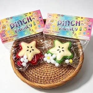 Star-shaped pinch squishy toys in red and green colors, 64g each, for stress relief.