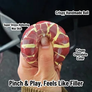 Palla antistress croccante fatta a mano rossa e gialla per gioco sensoriale e relax