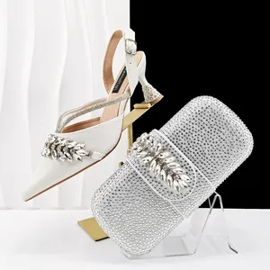 Elegant white rhinestone pointed toe slingback sandals and matching clutch bag evening set