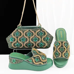 Matching emerald green crystal embellished evening bag and wedge slide sandals set