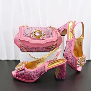 Luxury pink snakeskin high heels and matching rhinestone chain bag set for evening