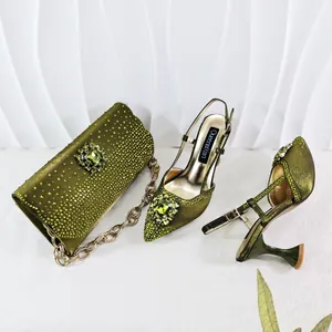 Close-up detail of olive green rhinestone pointed-toe sandals and matching clutch bag set