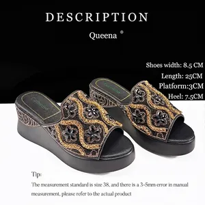 Elegant black wedge rhinestone slides with gold floral pattern for party evening wear.