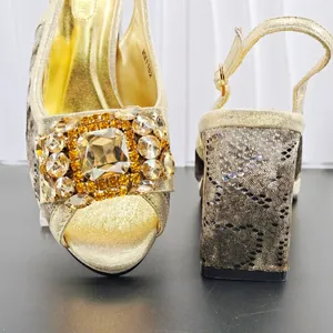 Luxury champagne gold evening sandals with chunky heel and oversized rhinestones