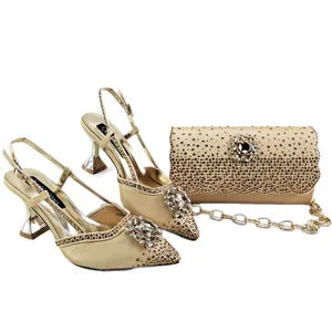 Elegant gold rhinestone pointed-toe block heel sandals with matching evening clutch bag set