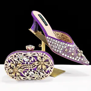 Elegant purple crystal-encrusted pointed-toe heels and matching evening clutch bag set