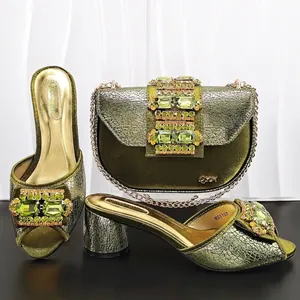 Green metallic cracked leather open-toe block heels with matching luxury saddle bag set