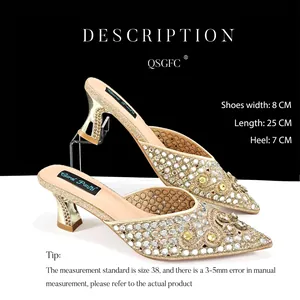 Elegant pointed toe gold mules with full rhinestone embellishment for weddings