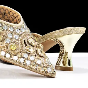 Elegant golden pointed-toe wedding sandals with all-over rhinestone embellishments