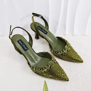 Elegant olive green pointed toe slingback heels featuring sparkling crystal embellishments.