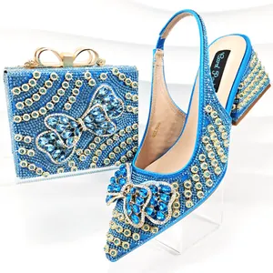 Royal blue rhinestone pointed toe shoe and bag set with exquisite crystal bowknot accents