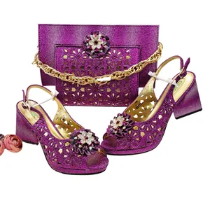 Purple glitter high heel sandals and matching envelope clutch bag set with rhinestone buckle.