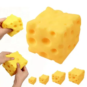 Large square cheese squishy toy showing slow rebound texture and multiple sizes.