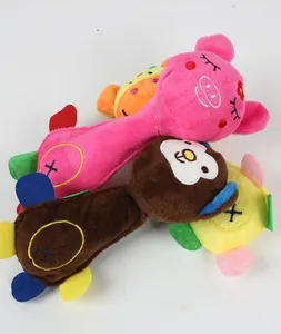 Close-up detail of colorful cartoon animal squeaky plush toys for puppy teeth grinding