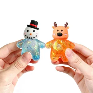 Giocattoli natalizi in maltosio glitterato a forma di pupazzo di neve e renna