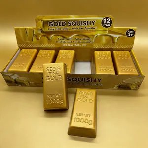 Macro detailed view of slow-rising gold brick squishy toys in display packaging