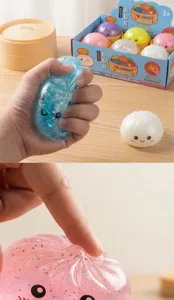 Detailansicht eines bunten Glitzer-Squishy-Spielzeugbrötchens mit Smiley und Textur