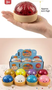 Nahaufnahme von glitzergefüllten Smiley-Brötchen-Squishy-Spielzeugen in verschiedenen Farben
