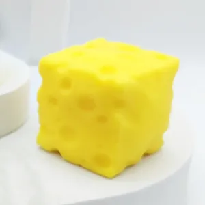 Yellow cheese-shaped squeeze toy cube for stress relief and fun tactile decompression