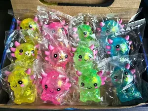 Glitzernde Axolotl-Quetschspielzeuge in bunter Einzelverpackung zum Stressabbau