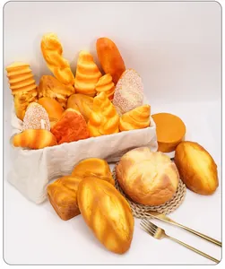 Close-up of slow-rebound PU artificial bread toys including baguettes and croissants