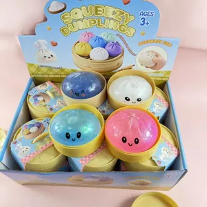 Bunte Glitzer-Dumpling-Antistress-Spielzeuge in einer Verkaufsbox für Kinder ab 3 Jahren