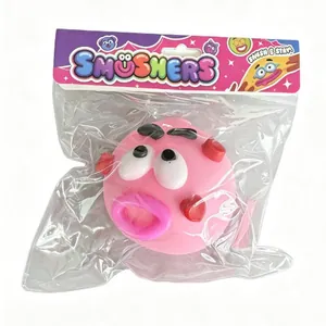 Funny pink Smushers face squishy stress relief toy ball with original retail packaging