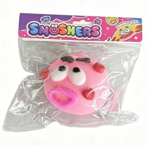 Pink Smushers funny face squishy toy stress relief ball in official retail packaging