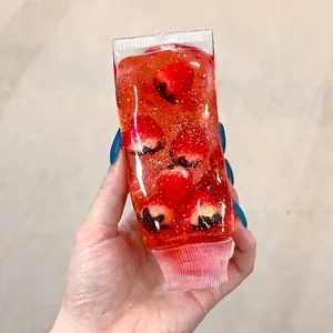 Transparentes Erdbeer-Zahnpasta-Gel-Quetschspielzeug zum Stressabbau und für Spaß