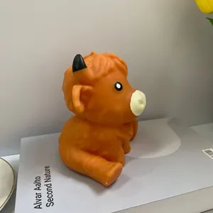 Detail shot showing the texture of orange Highland Cow squishy toy for stress relief.