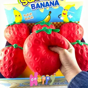 Juguete gigante de fresa squishy para aliviar el estrés con textura de espuma suave.