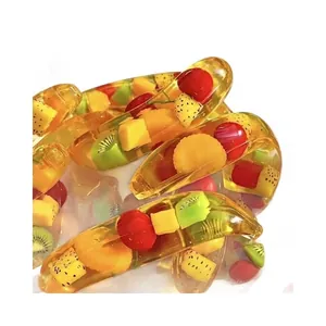 Kreatives transparentes Bananen-Squishy-Spielzeug mit Fruchteinlagen zum Stressabbau