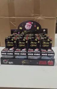 Retail display box of Christmas themed NICE CUBE glow-in-the-dark squishy stress relief toys