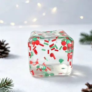 Christmas square squishy toy with red and green sprinkles for festive stress relief