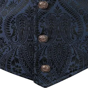 Close-up of blue paisley medieval waistcoat with vintage embossed metallic buttons.
