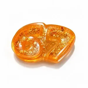 Giocattolo antistress numero 67 arancione traslucido con glitter dorati per il relax e divertimento