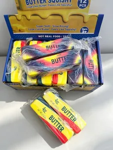 Gedetailleerd overzicht van langzaam stijgende boter-squishy-speelgoedset in doos