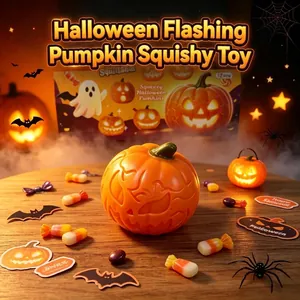 Glowing Halloween pumpkin squeeze toy with spooky expressions and festive decorations