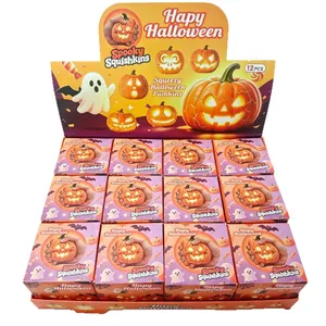 Spooky Halloween glowing pumpkin squishy toy set in a 12-piece retail display box
