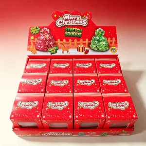 Juguetes squishy con forma de árbol de Navidad y lentejuelas en caja roja de regalo