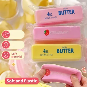 Close-up of pink butter stick squishy toy showing soft slow rebound texture