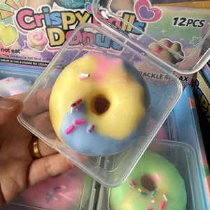 Detail of a colorful crispy donut squishy toy inside a transparent protective plastic box