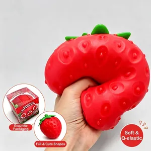 Large strawberry squishy stress relief toy with realistic fruit texture for squeezing